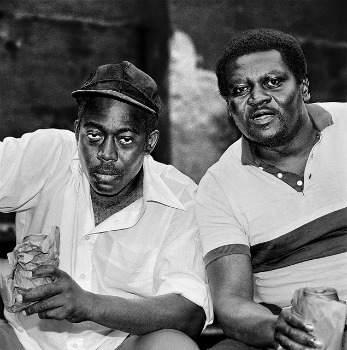 two-black-men-dranking-beer